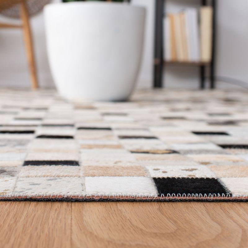 Studio Leather STL810 Hand Woven Area Rug - Ivory/Black - 5'x8' - Safavieh.