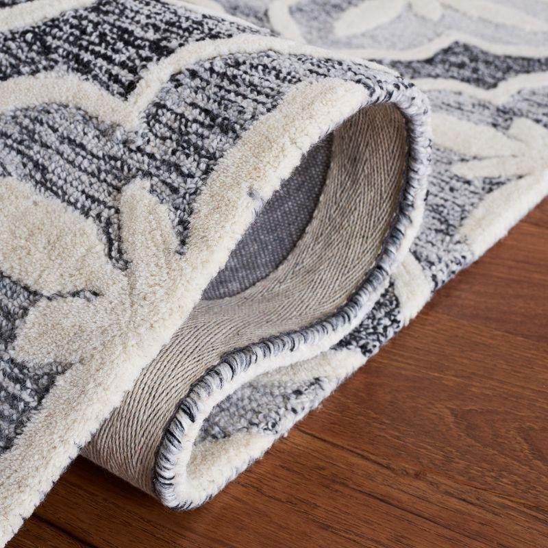 Metro MET872 Hand Tufted Area Rug - Black/Ivory - 6'x6' - Safavieh.