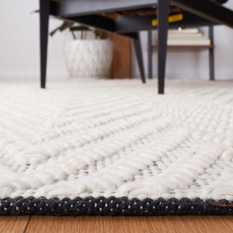 Handmade Black and Ivory Wool Tufted Square Rug