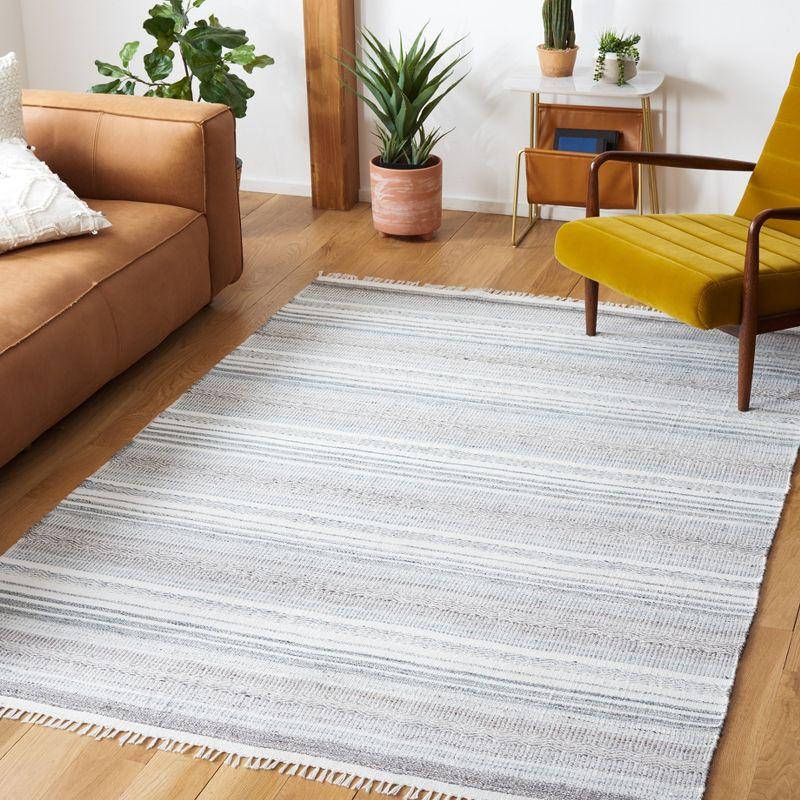 Bohemian Nomadic Ivory Synthetic 8' x 10' Flat Woven Rug