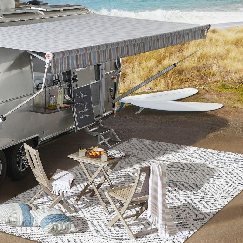 4'x6' Jordan High-Low Pile Art Deco Geometric Indoor/Outdoor Area Rug, White/Black - JONATHAN Y