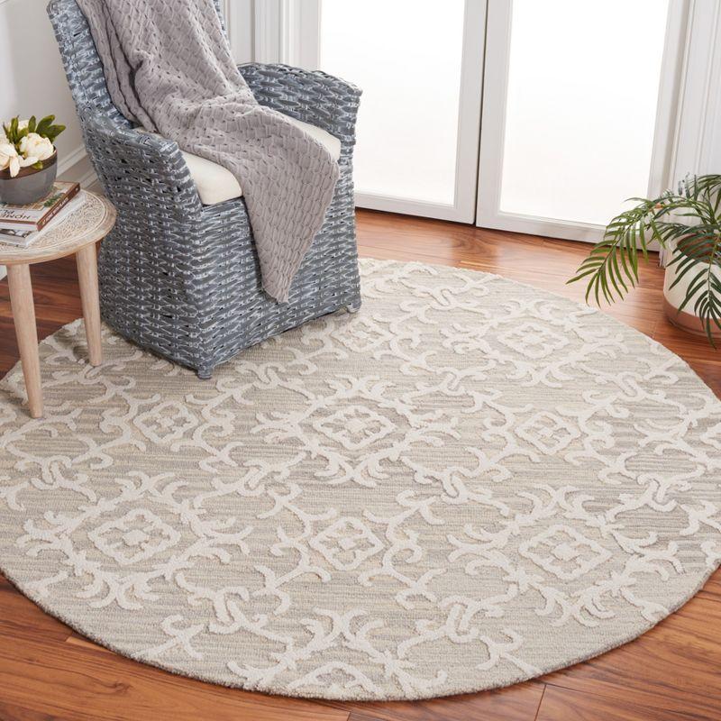 Blossom BLM104 Hand Tufted Area Rug - Grey/Ivory - 4' round - Safavieh.