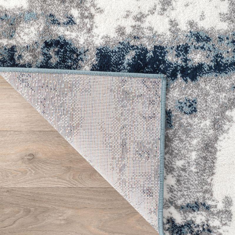 Abstract Blue Tufted Synthetic 7' 10" x 10' Area Rug