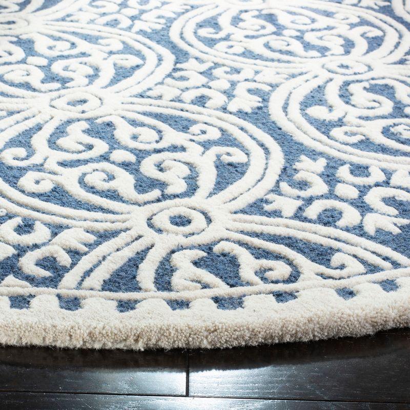 Cambridge CAM123 Hand Tufted Area Rug  - Safavieh