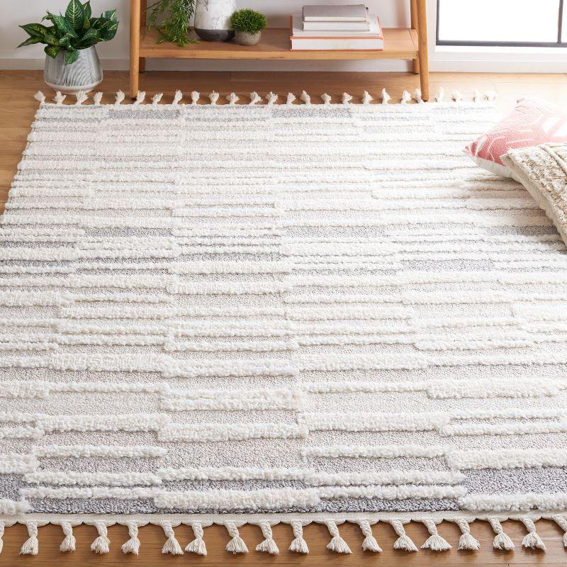 Ivory and Beige Braided Round Shag Area Rug