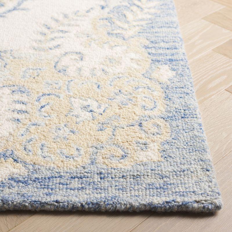 Ebony EBN121 Handmade Tufted Accent Rug - Blue/Ivory - 3' X 5' - Safavieh