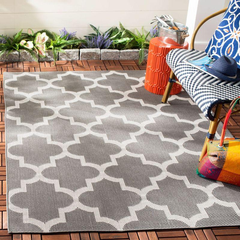 Grey and Ivory 8' x 10' Reversible Synthetic Area Rug