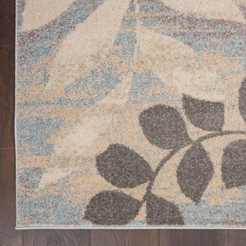 Ivory and Light Blue Floral Synthetic 6' x 9' Area Rug