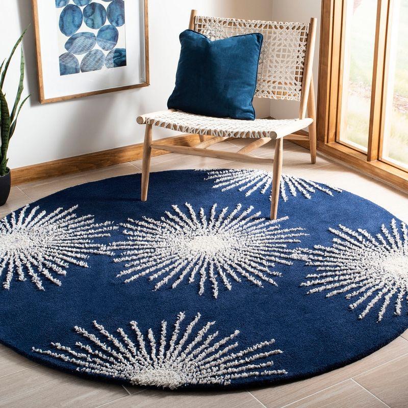 Soho SOH712 Hand Tufted Indoor Area Rug - Dark Blue/Ivory - 8' round - Safavieh.