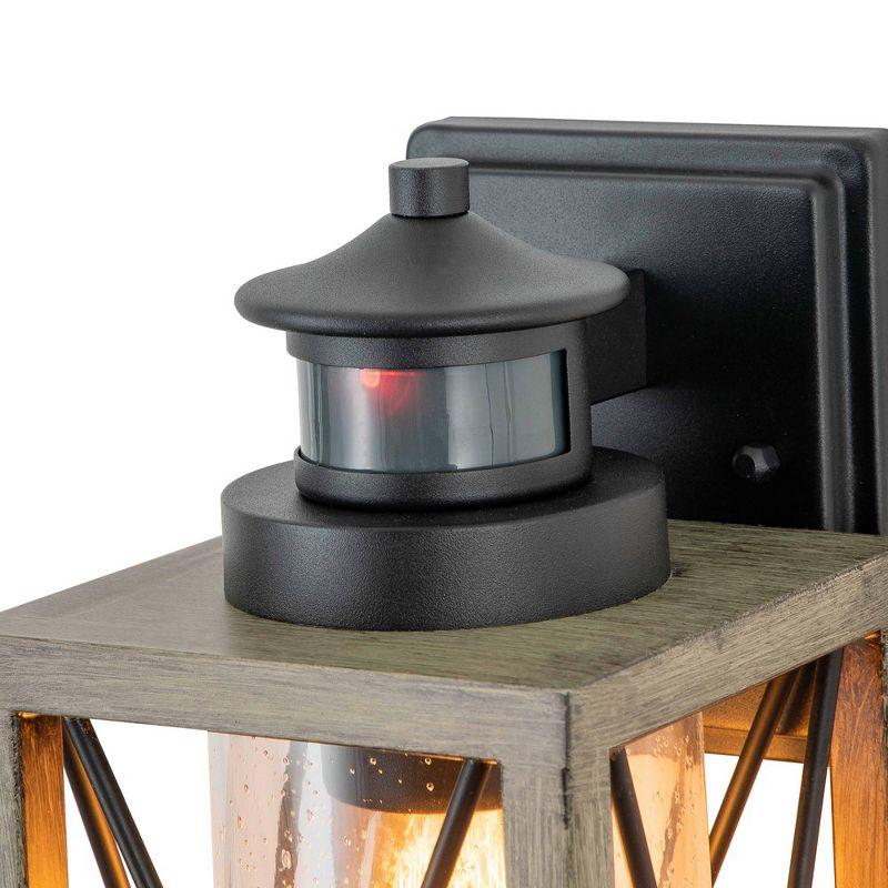 C Cattleya 1-Light Black and Faux Wood Motion Sensing Dusk to Dawn Outdoor Wall Light with Clear Seeded Glass