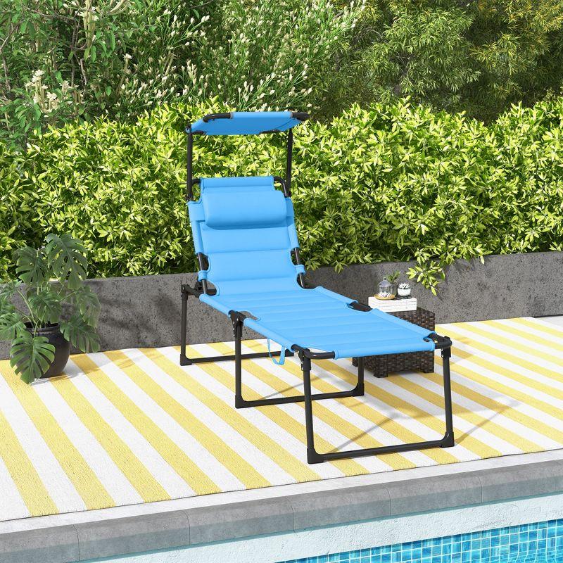 Outsunny Outdoor Lounge Chair, 4 Position Adjustable Backrest Folding Lounge, Cushioned Tanning Chair w/ Sun Shade Roof & Pillow Headrest, Light Blue