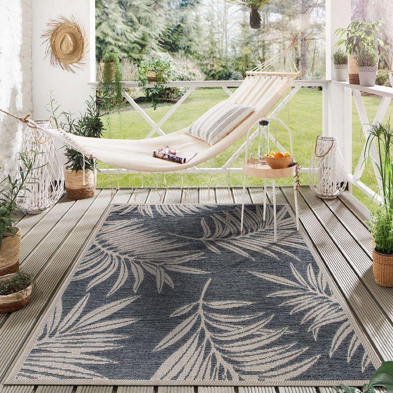 Blue Floral 5' x 7' Reversible Synthetic Area Rug