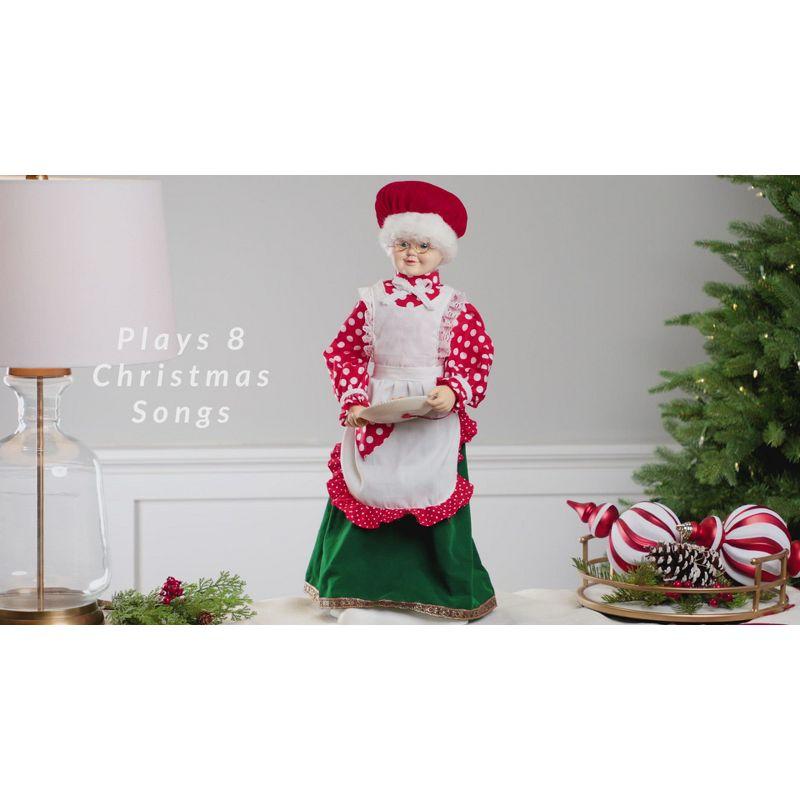 Mrs. Claus with Gingerbread Cookie Figure