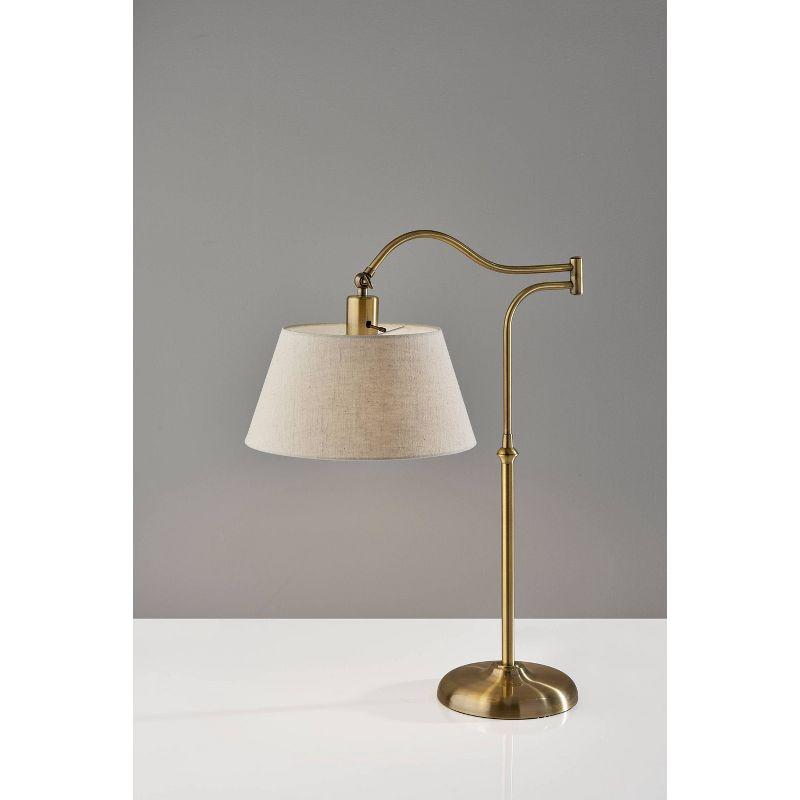 Antique Brass Adjustable Swing Arm Table Lamp with Cream Shade