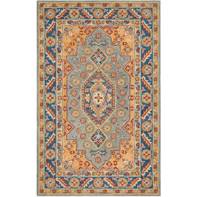 Antiquity AT504 Hand Tufted Area Rug - Blue/Gold - 5'x8' - Safavieh.
