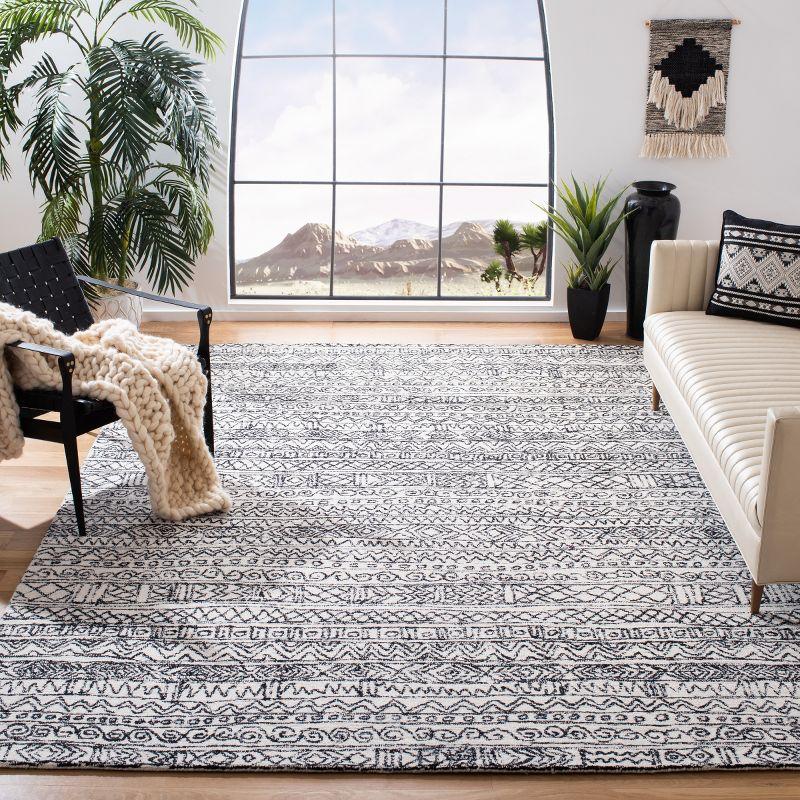 Ivory and Black Hand-Tufted Wool 9' x 12' Area Rug