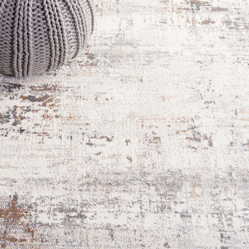 Ivory and Gray Abstract 8' x 10' Stain-Resistant Rug