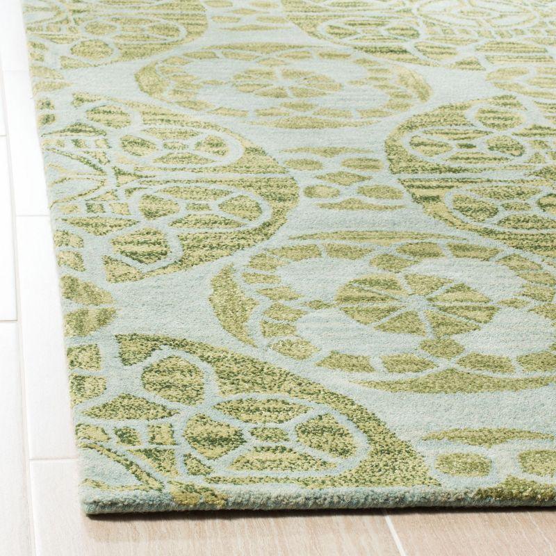 Handmade Turquoise and Green Wool Tufted Area Rug, 5' x 8'