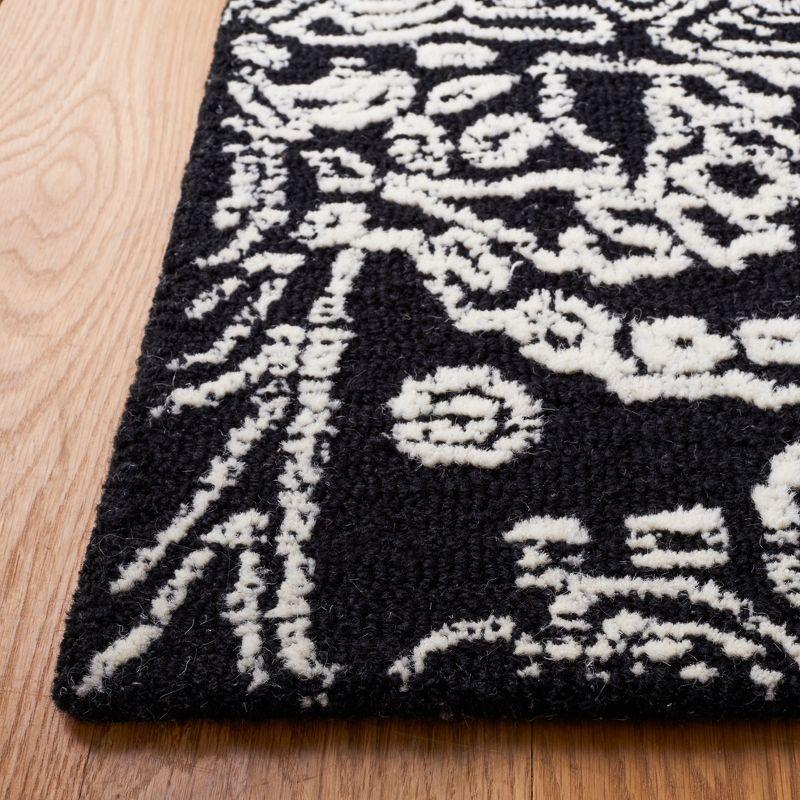 Black and Ivory Hand-Tufted Wool 4' x 6' Area Rug