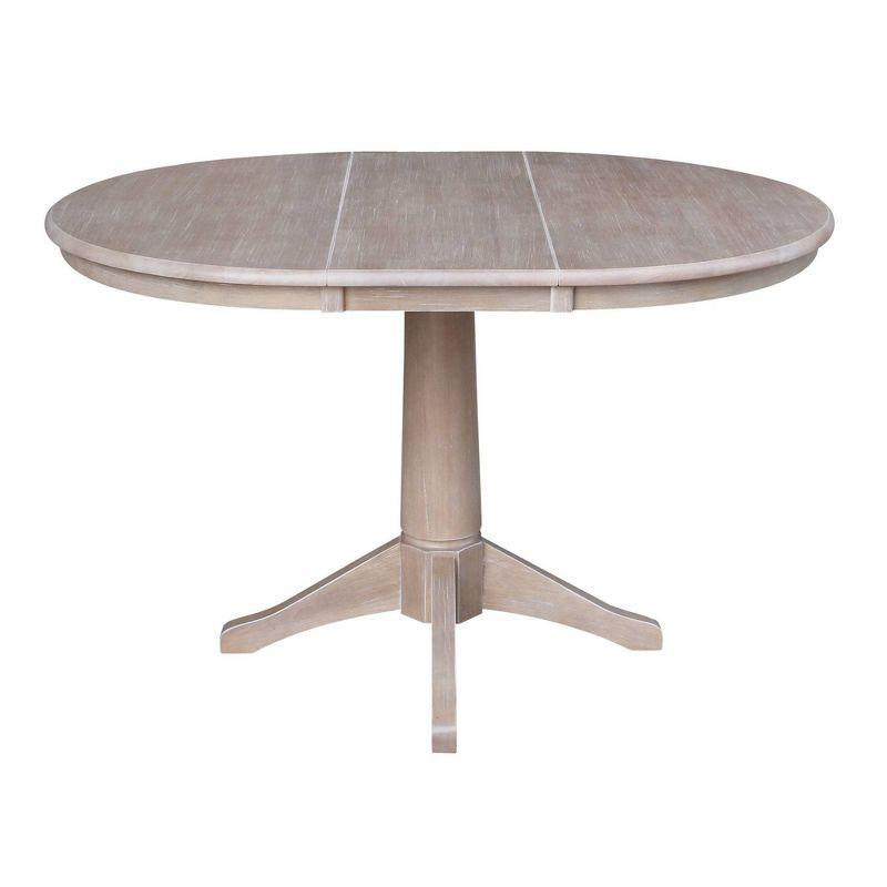 36" Magnolia Round Top Dining Table with 12" Leaf Washed Gray Taupe - International Concepts: Hardwood Pedestal Base, Seats 4