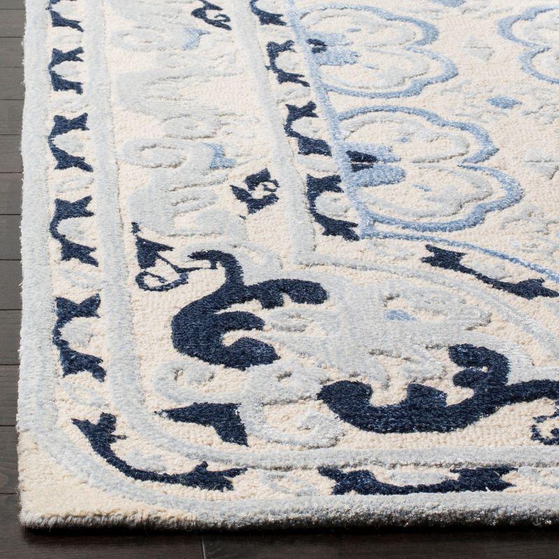 Elegant Ivory and Blue 5' Square Hand-Tufted Wool Area Rug