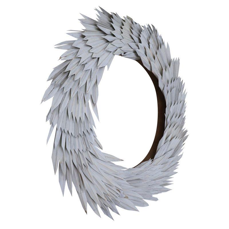 Vickerman Natural Botanicals 24" White Washed Palm Sun Wreath. This wreath measures 24 inches in diameter. It features white washed palm sun leaves on