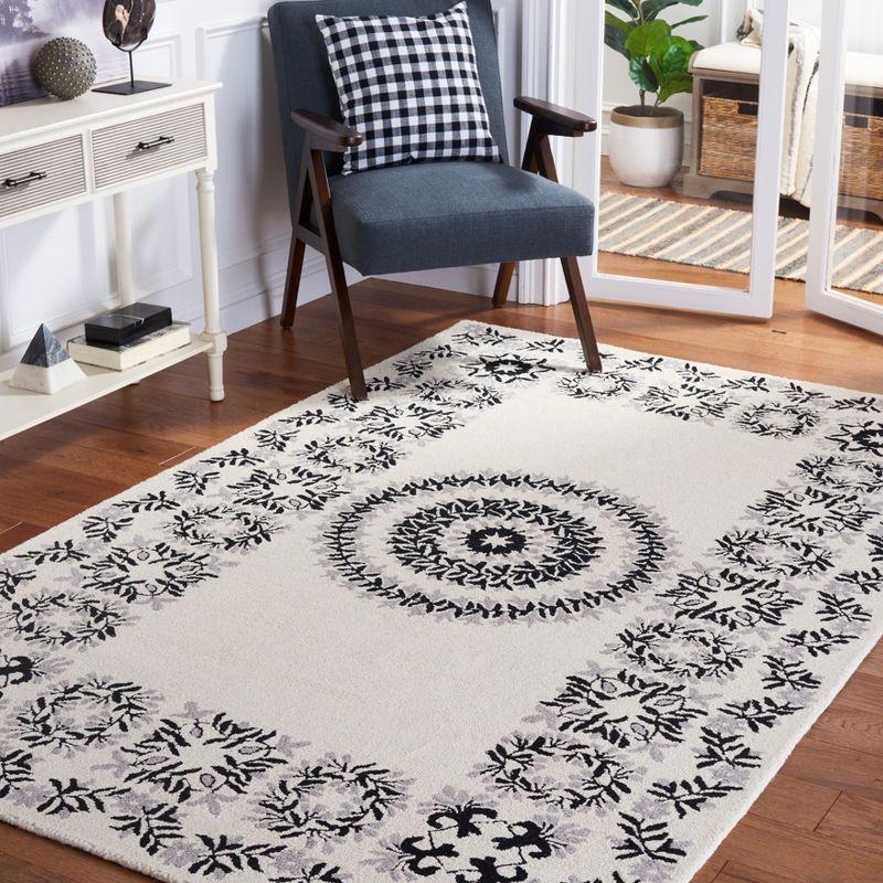Empire EM826 Hand Tufted Area Rug - Ivory/Black - 3'x5' - Safavieh.