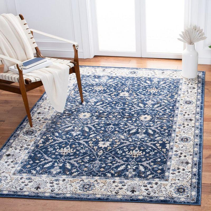 Ivory Geometric 4' x 6' Hand-Knotted Synthetic Area Rug