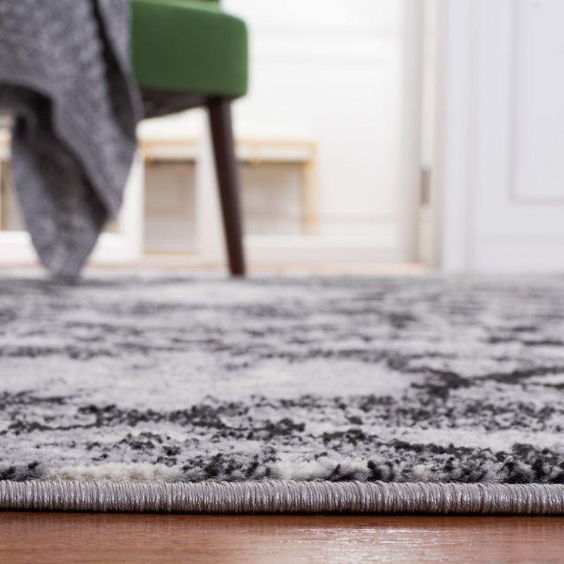 Brentwood Black and Ivory Square Synthetic Area Rug