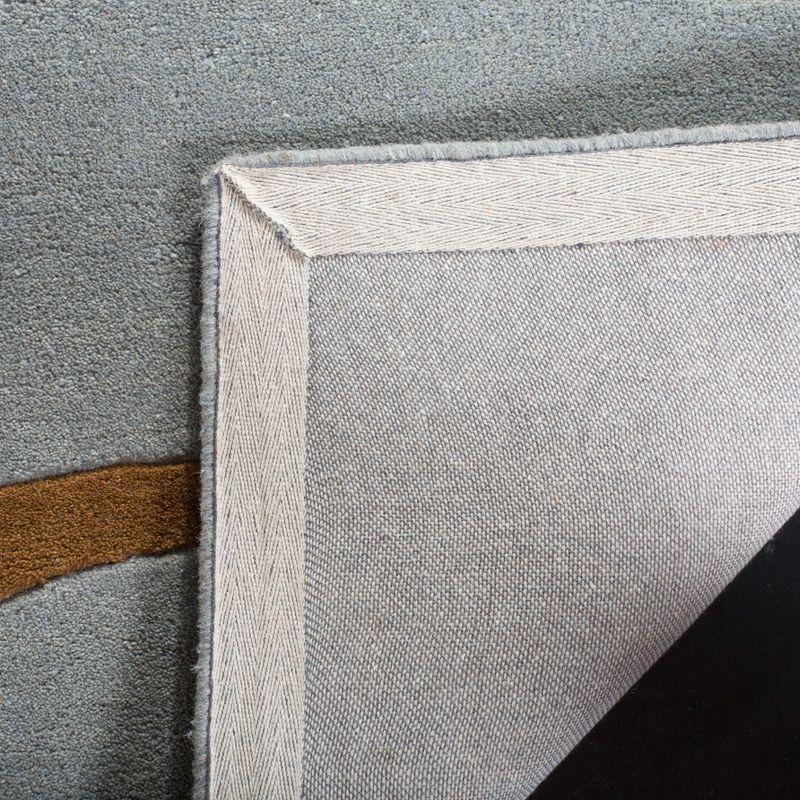 Soho SOH801 Hand Tufted Indoor Area Rug - Blue/Multi - 5'x8' - Safavieh