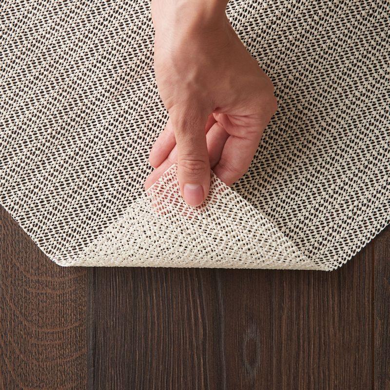 Ebern Designs Rectangle Shiftloc Solid Color Machine Made Polyester/Plastic/Acrylic Area Rug in Ivory