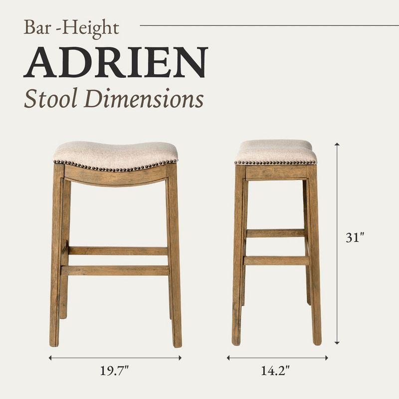 Maven Lane Adrien 31 Inch Bar Height Upholstered Backless Saddle Barstool in Natural Wood Finish with Wheat Cream Fabric Cushion Seat, Set of 2