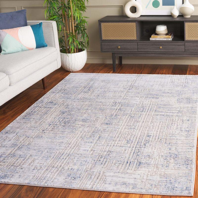 Ivory and Blue Synthetic Easy Care Area Rug