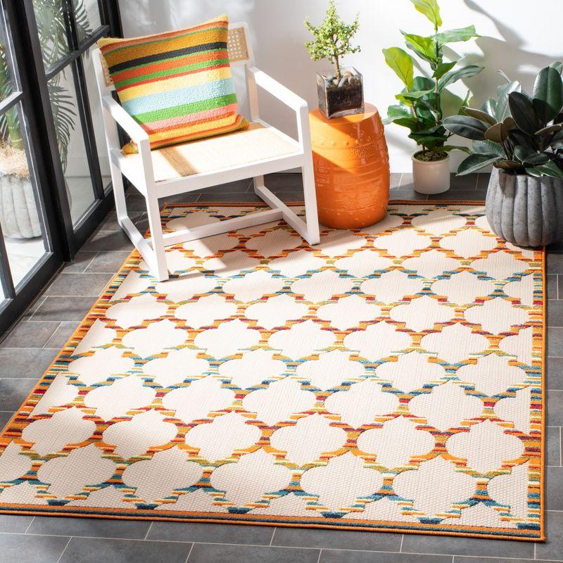 Ivory and Orange Geometric Synthetic Indoor/Outdoor Rug