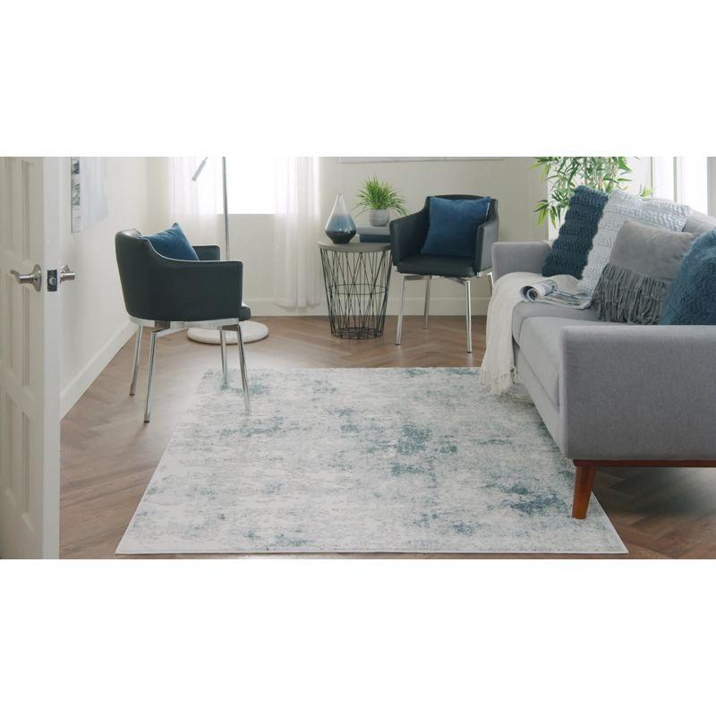 Nourison Trance TRC06 Indoor Area Rug - Ivory Blue 6'6" x 9'6"