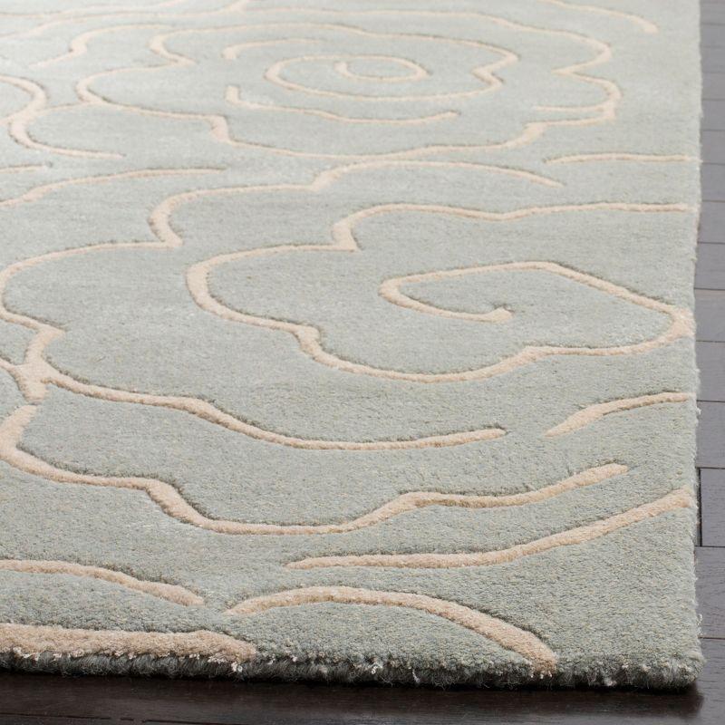 Soho SOH812 Hand Tufted Area Rug - Soft Lt. Blue/Ivory - 7'6"x9'6" - Safavieh.