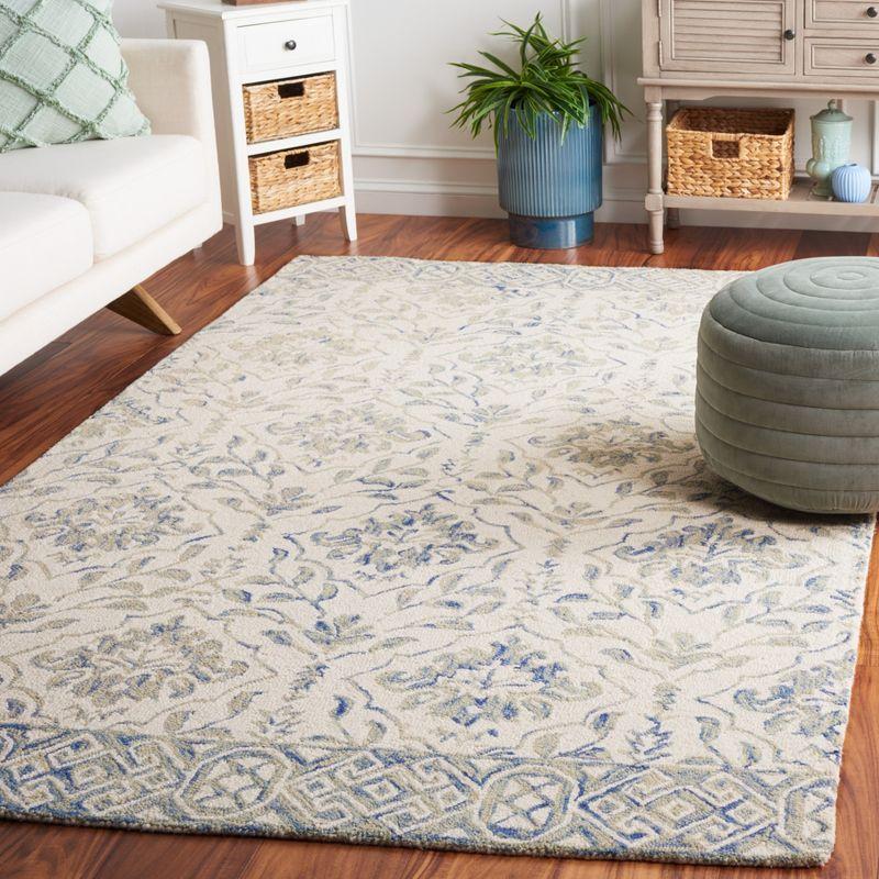 Ivory and Light Blue Hand-Tufted Wool Area Rug, 5' x 8'