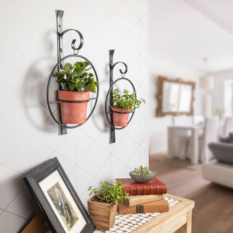 Set of 2 Black Iron Hanging Planters with Terracotta Pots