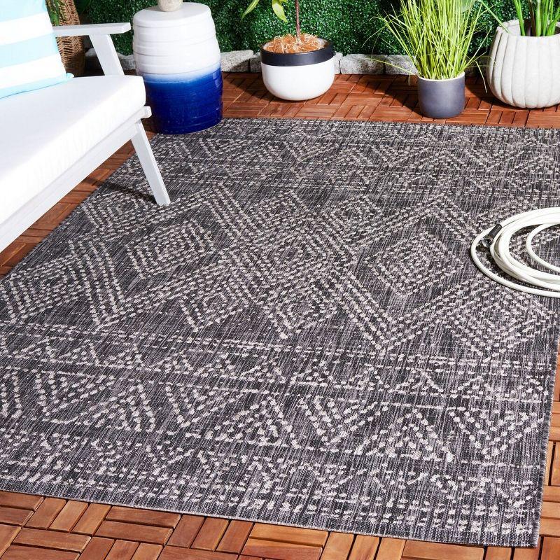 Black and Beige Rectangular Geometric Indoor/Outdoor Area Rug