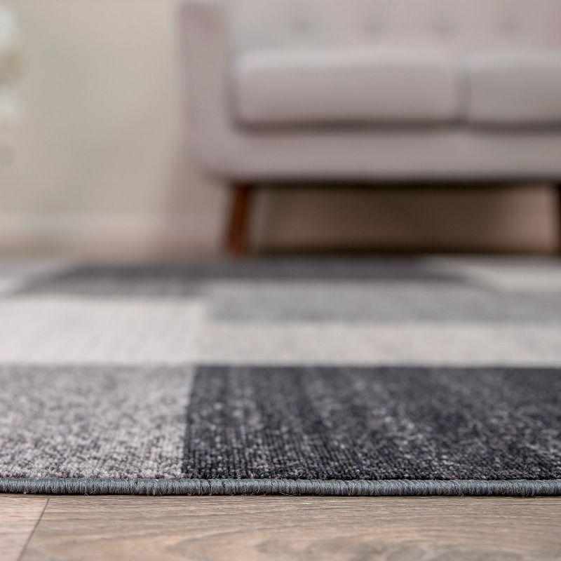 GeoSync 8' x 10' Gray Geometric Tufted Synthetic Area Rug