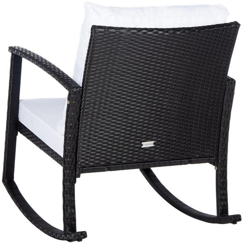 Breezy Black PE Rattan Rocking Chair with Plush White Cushions