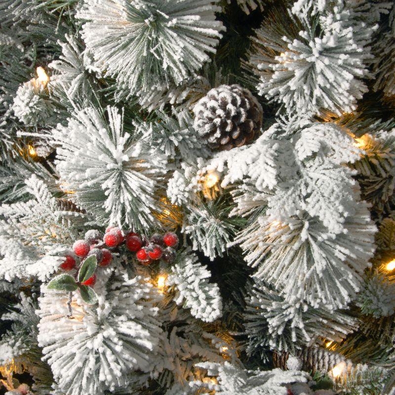 The Holiday Aisle® 7.5ft. Snowy Bedford Pine Tree with Clear Lights