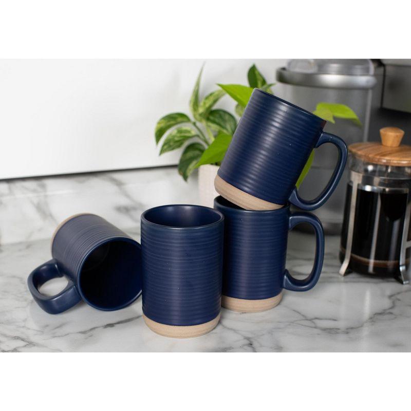 Elanze Designs Tall Ribbed Raw Clay Bottom Navy Blue 16 ounce Ceramic Coffee Mugs Set of 4