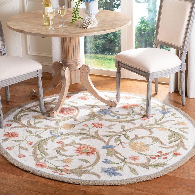 Handmade Ivory Floral Round Wool Rug, 8' x 8'