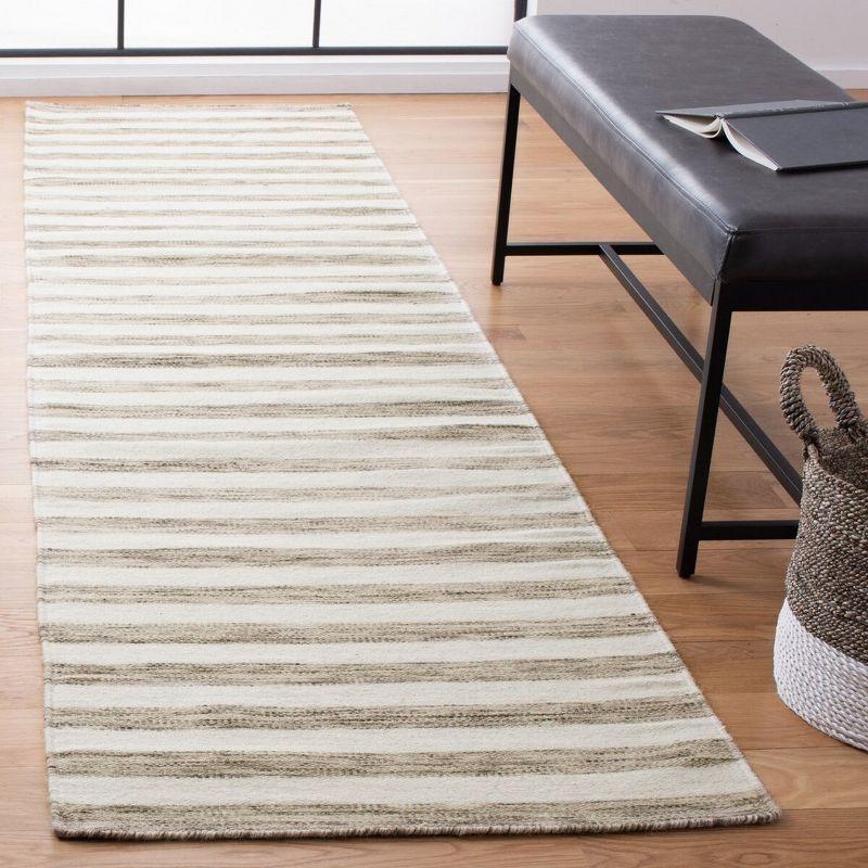 Dhurries DHU575 Hand Woven Flat Weave Runner Rug  Brown / Ivory 2'-6" X 10' - Safavieh.