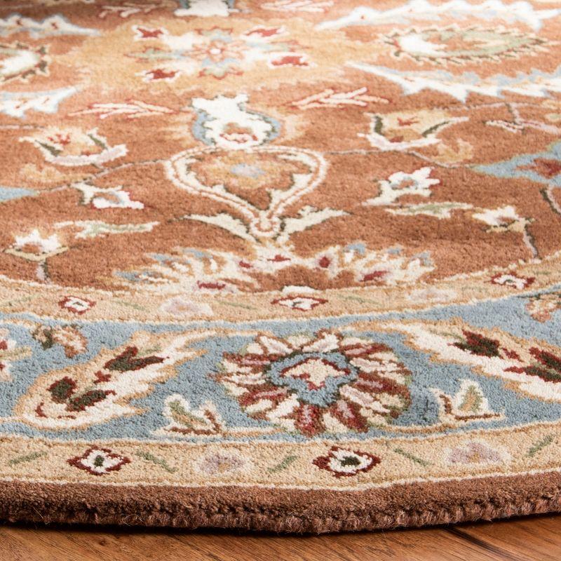 Heritage HG968 Handmade Area Rug - 8'3"x11' - Brown/Blue - Safavieh