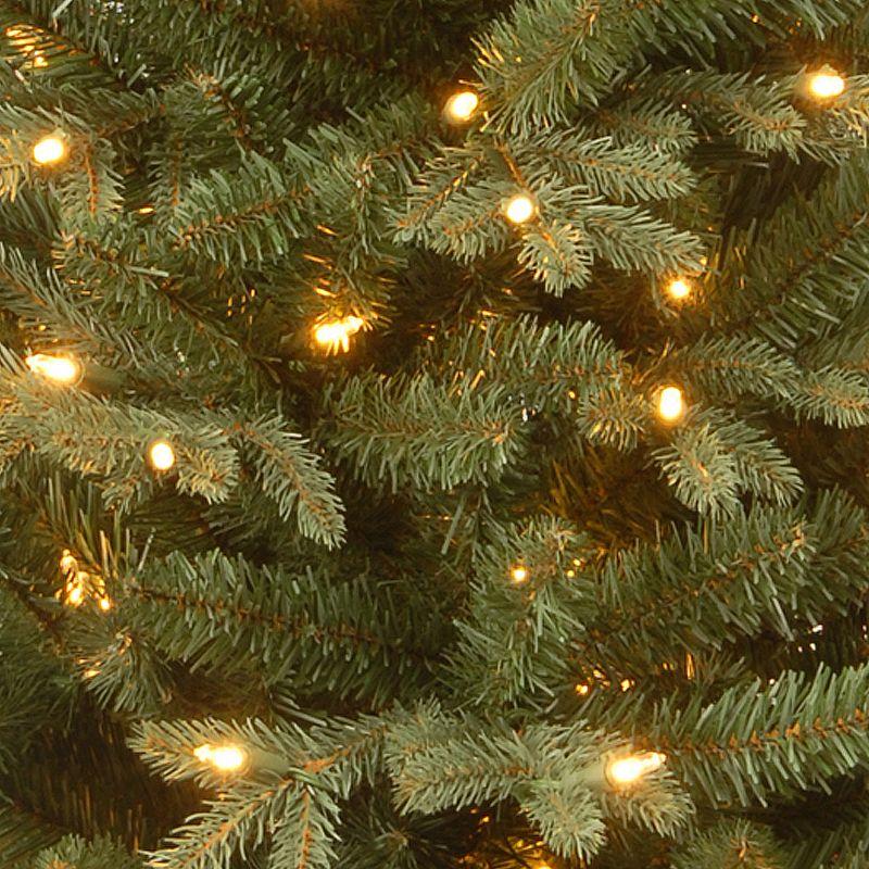 The Holiday Aisle® 3ft. Everyday Collection Potted Evergreen Tree with Clear Lights