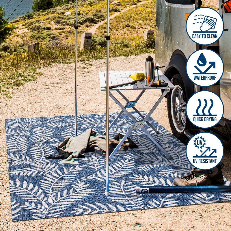 Ivory and Navy Palm Frond 4' x 6' Reversible Outdoor Rug