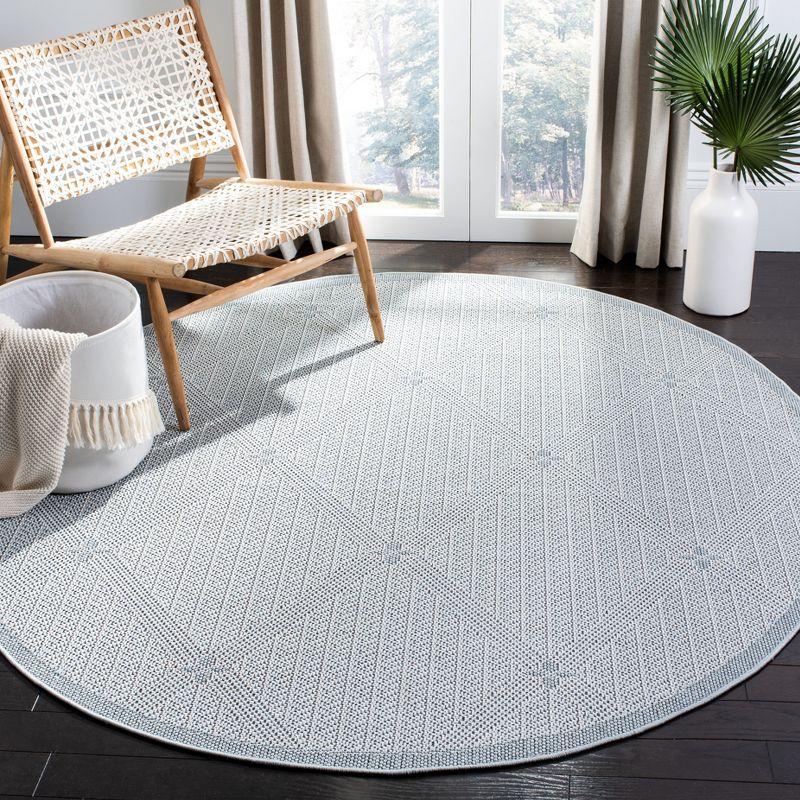 Light Blue Diamond Pattern Round Synthetic Rug