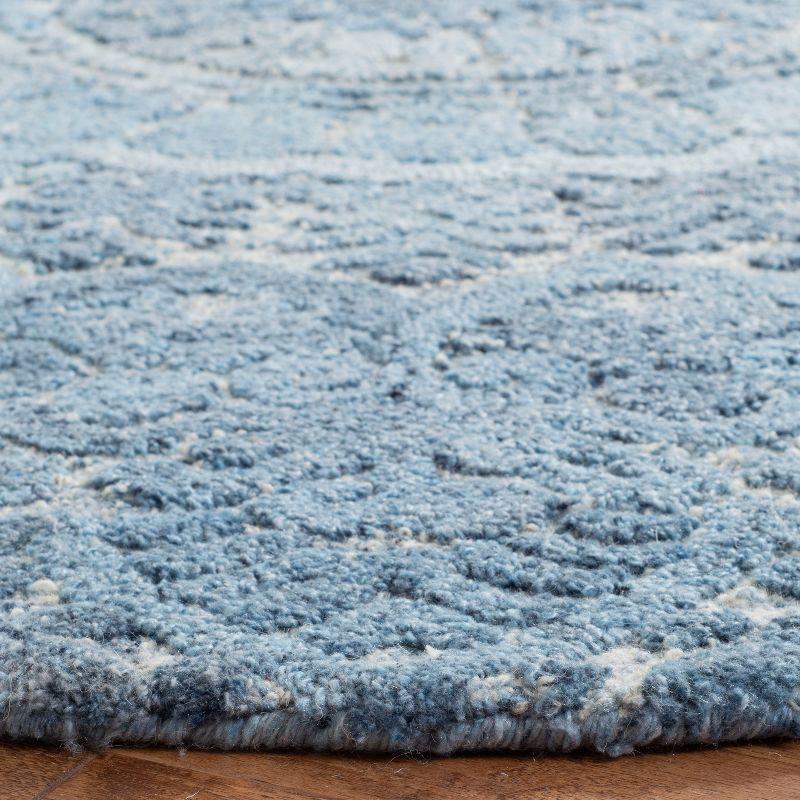 Marquee MRQ110 Hand Tufted Indoor Area Rug - Blue/Ivory - 6' Round - Safavieh